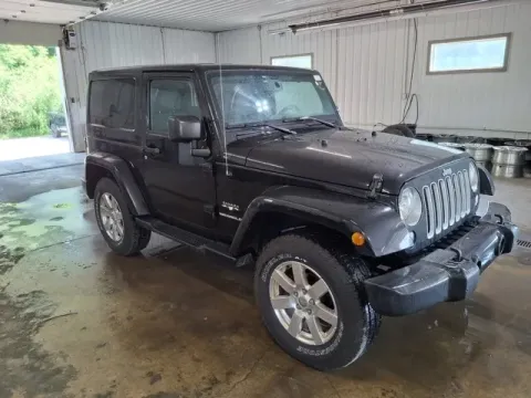 Another view of 2016 Jeep Wrangler Sahara for sale in Michigan Center, MI at Monster Motors - Jackson, MI
