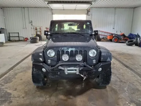 Photos of 2016 Jeep Wrangler Unlimited Sport for sale in Michigan Center, MI at Monster Motors - Jackson, MI