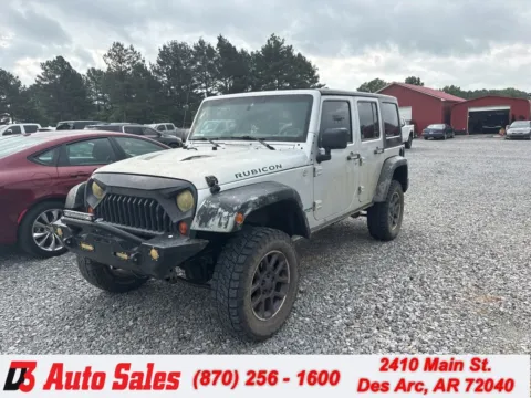 Silver 2011 Jeep Wrangler Unlimited Rubicon for sale in Des Arc, AR