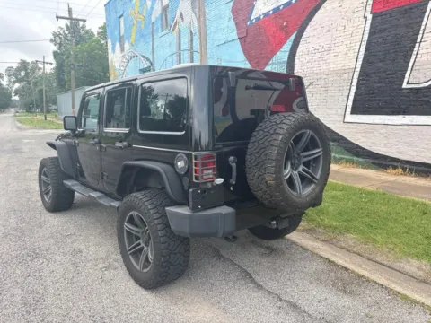 More photos of 2014 Jeep Wrangler Unlimited Sahara Dragon Edition at D3 Auto Sales - Des Arc, AR, AR