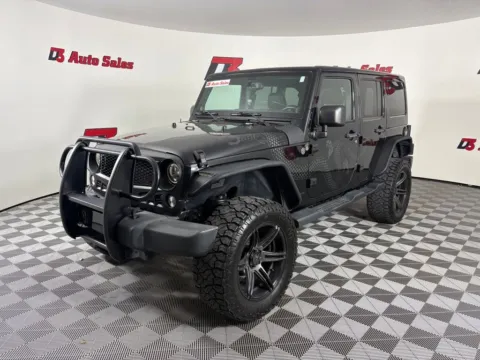 Black 2014 Jeep Wrangler Unlimited Sahara Dragon Edition for sale in Des Arc, AR
