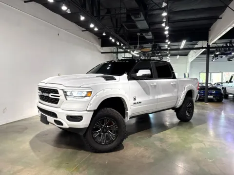 Photos of 2023 RAM 1500 Big Horn Crew Cab SWB 4WD BLACK WIDOW for sale in Scottsdale, AZ at Spady Auto Group