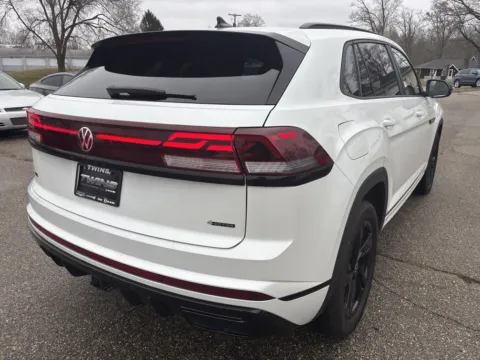 Another view of 2025 Volkswagen Atlas Cross Sport 2.0T SEL R-Line Black for sale in Wayland, MI at Twins Chrysler Dodge Jeep Ram