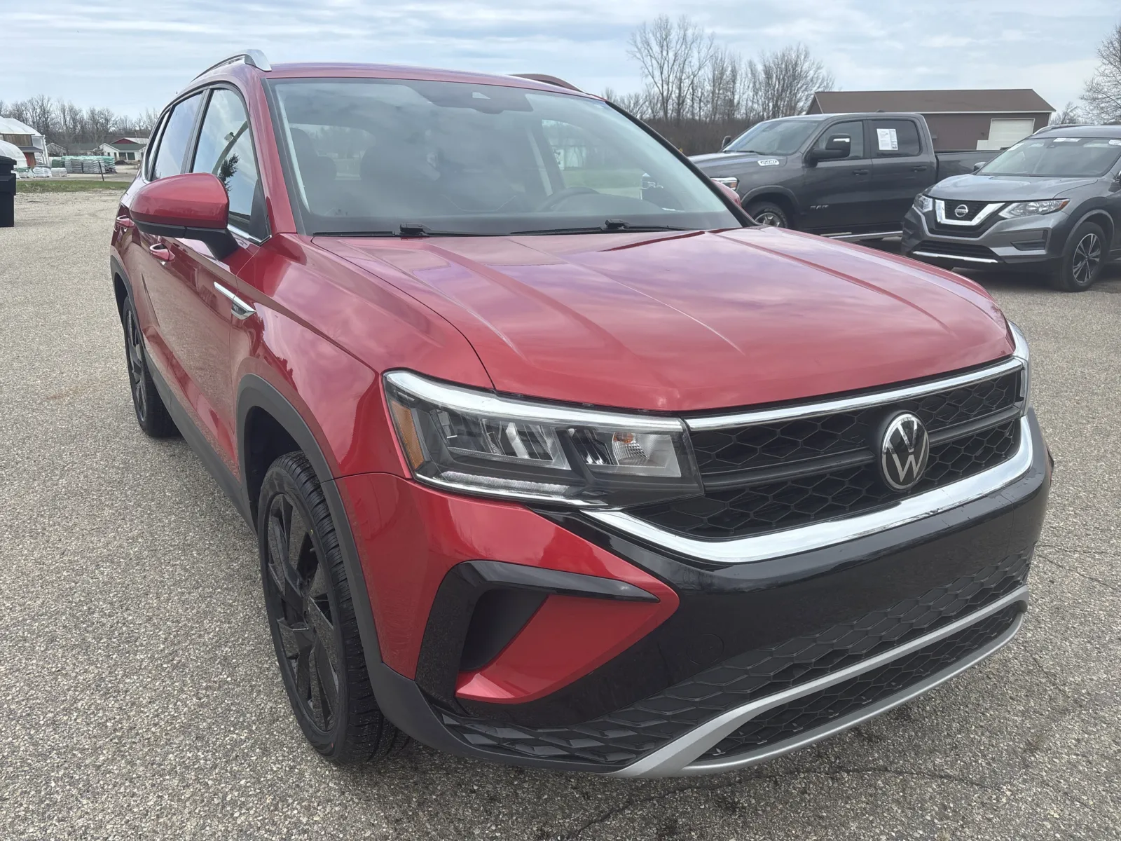 Red 2024 Volkswagen Taos SE for sale in Wayland, MI