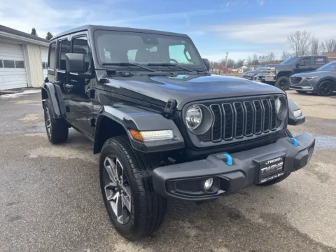Black 2024 Jeep Wrangler 4xe Sport S for sale in Wayland, MI