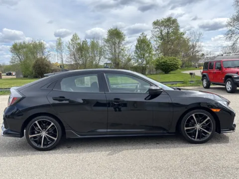 Photos of 2021 Honda Civic Hatchback Sport for sale in Wayland, MI at Twins Chrysler Dodge Jeep Ram