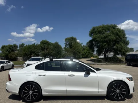 Photos of 2023 Volvo S60 Recharge Plug-In Hybrid Plus Dark Theme for sale in Wayland, MI at Twins Chrysler Dodge Jeep Ram