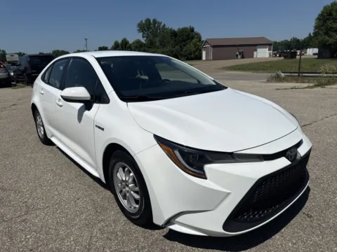 White 2021 Toyota Corolla Hybrid LE for sale in Wayland, MI