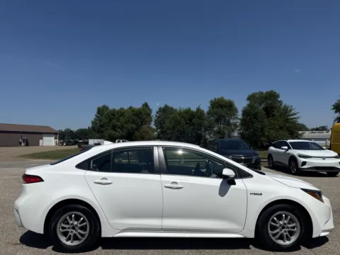 Photos of 2021 Toyota Corolla Hybrid LE for sale in Wayland, MI at Twins Chrysler Dodge Jeep Ram