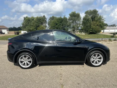 Photos of 2023 Tesla Model Y Long Range for sale in Wayland, MI at Twins Chrysler Dodge Jeep Ram