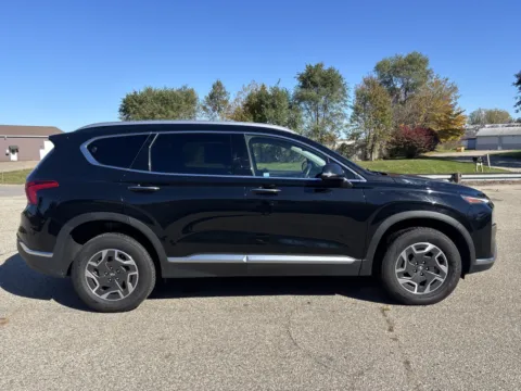 Photos of 2023 Hyundai Santa Fe Hybrid Blue for sale in Wayland, MI at Twins Chrysler Dodge Jeep Ram
