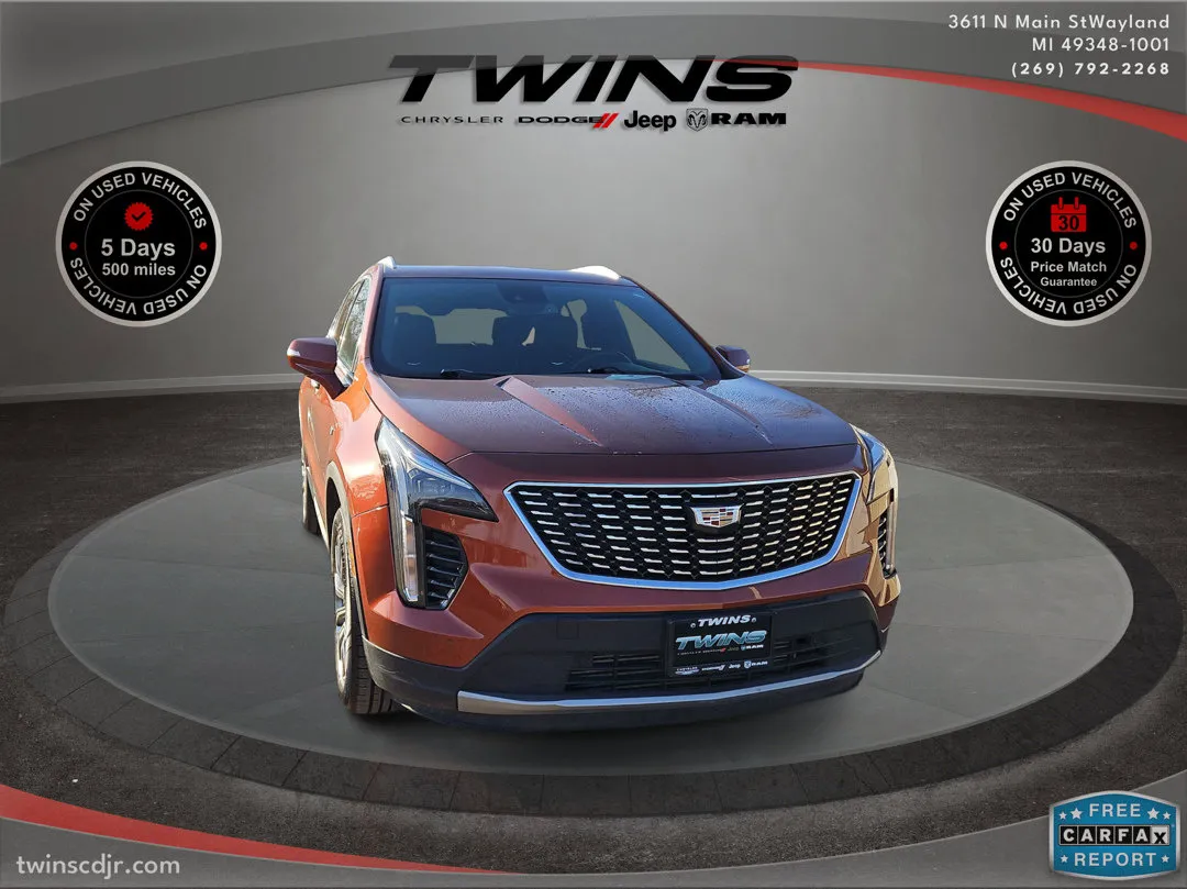 Orange 2021 Cadillac XT4 AWD Premium Luxury for sale in Wayland, MI