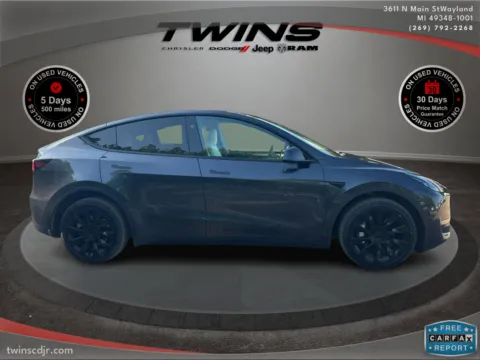 Photos of 2024 Tesla Model Y Long Range for sale in Wayland, MI at Twins Chrysler Dodge Jeep Ram