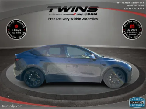 Photos of 2023 Tesla Model Y STATDARD RANGE for sale in Wayland, MI at Twins Chrysler Dodge Jeep Ram
