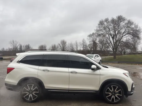 Photos of 2019 Honda Pilot Touring 8-Passenger for sale in Wayland, MI at Twins Chrysler Dodge Jeep Ram
