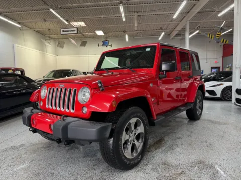 Red 2016 Jeep Wrangler Unlimited Sahara for sale in Troy, MI