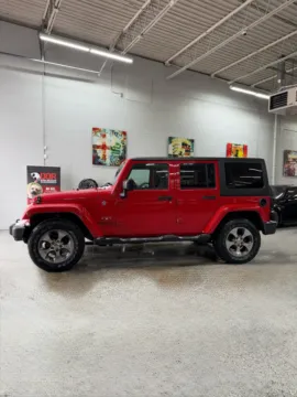 Photos of 2016 Jeep Wrangler Unlimited Sahara for sale in Troy, MI at City of Cars