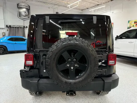 Another view of 2015 Jeep Wrangler Unlimited Sahara for sale in Troy, MI at City of Cars