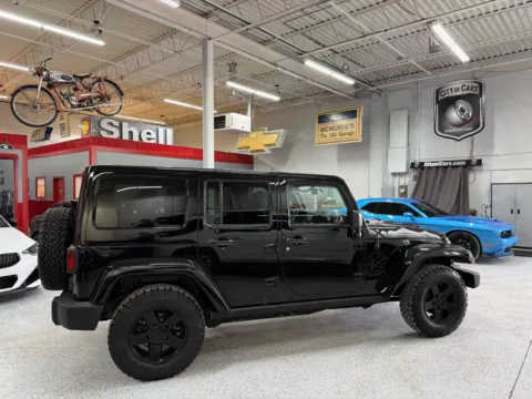 More photos of 2015 Jeep Wrangler Unlimited Sahara at City of Cars, MI
