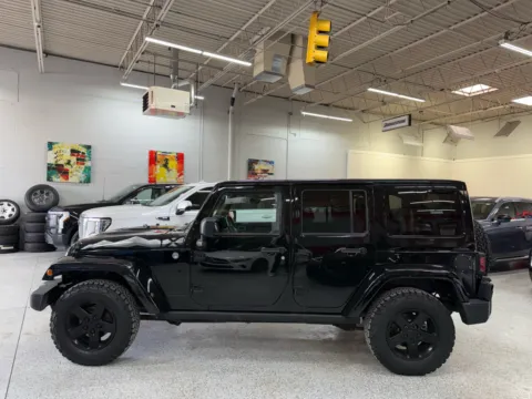 Photos of 2015 Jeep Wrangler Unlimited Sahara for sale in Troy, MI at City of Cars