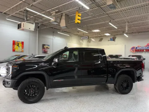 Photos of 2023 GMC Sierra 1500 4WD Crew Cab Short Box AT4X for sale in Troy, MI at City of Cars