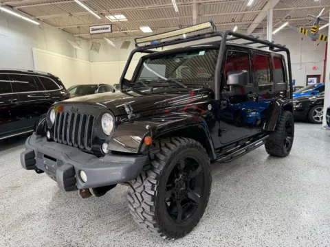 Black 2016 Jeep Wrangler Unlimited Sahara for sale in Troy, MI