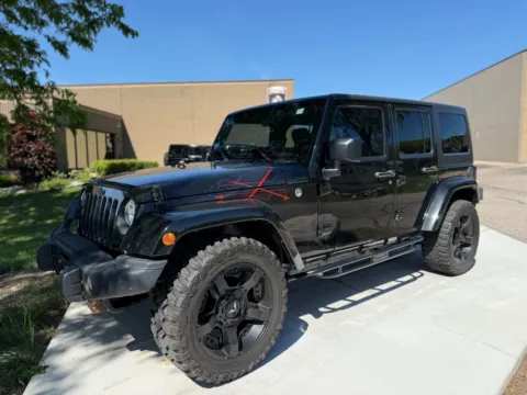 Black 2016 Jeep Wrangler Unlimited Sahara for sale in Troy, MI