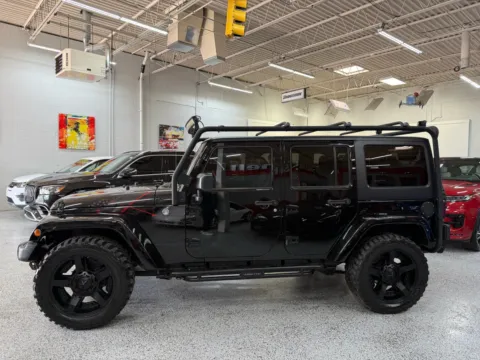 Photos of 2016 Jeep Wrangler Unlimited Sahara for sale in Troy, MI at City of Cars