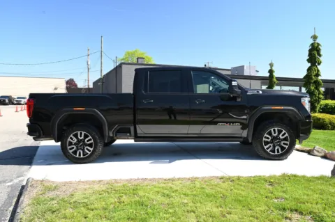 More photos of 2022 GMC Sierra 2500HD 4WD Crew Cab Standard Bed AT4 at City of Cars, MI