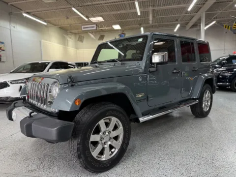 Gray 2015 Jeep Wrangler Unlimited Sahara for sale in Troy, MI