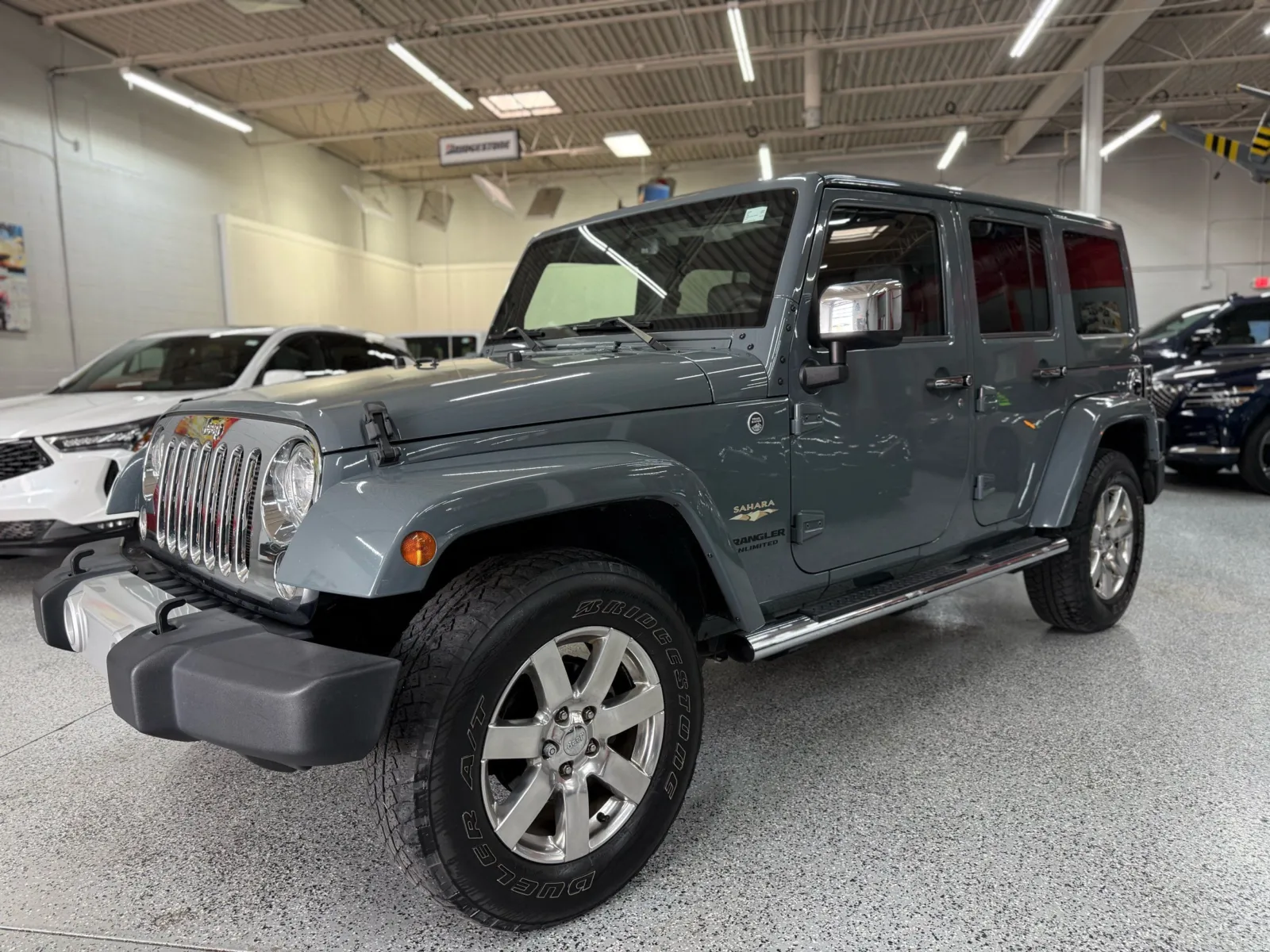 Gray 2015 Jeep Wrangler Unlimited Sahara for sale in Troy, MI