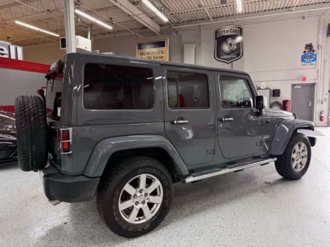 More photos of 2015 Jeep Wrangler Unlimited Sahara at City of Cars, MI