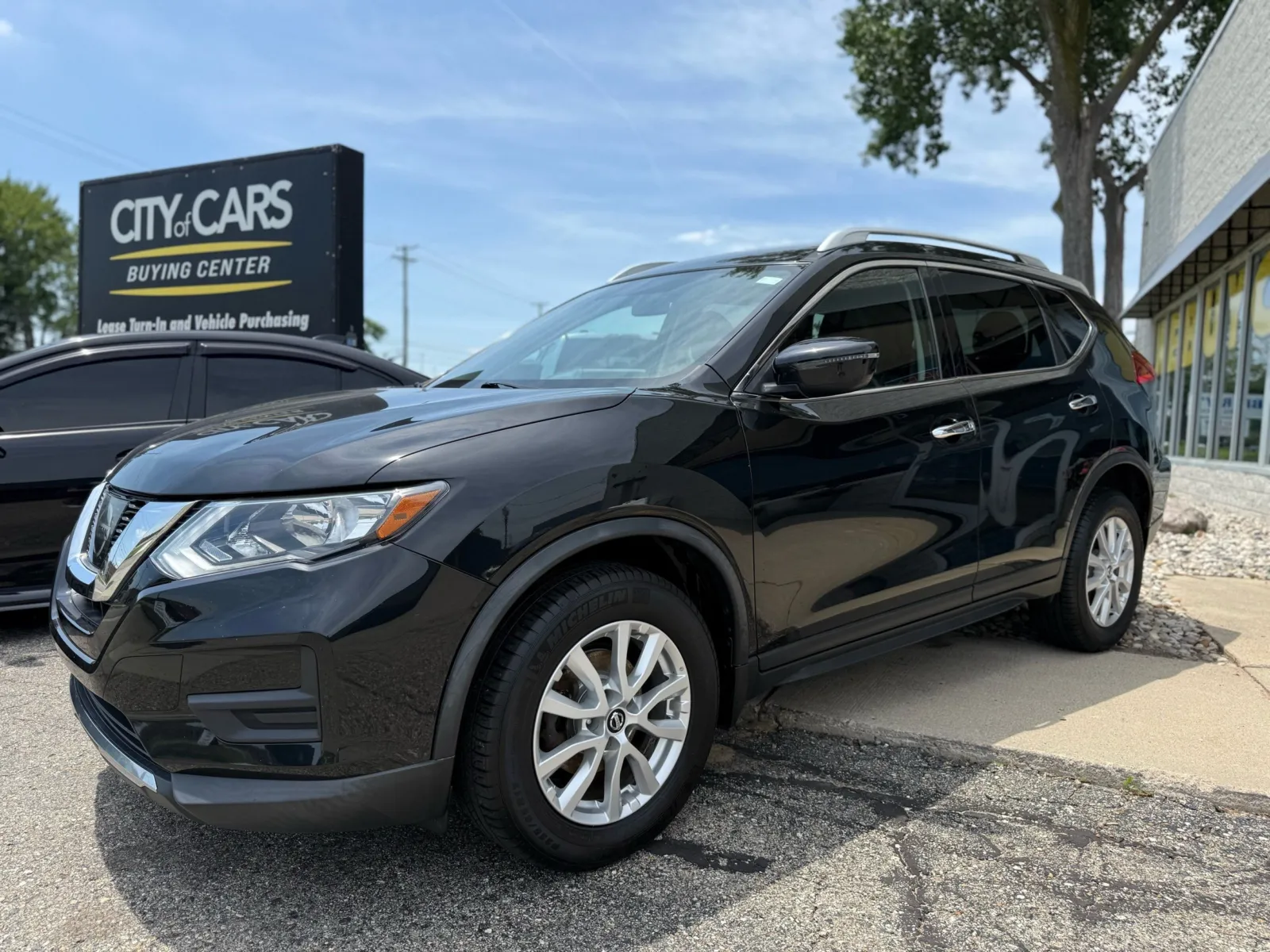 Black 2017 Nissan Rogue SV for sale in Troy, MI