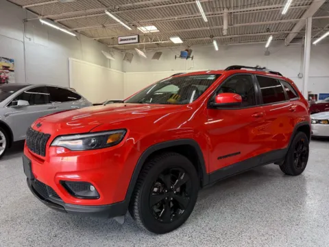 Orange 2021 Jeep Cherokee Altitude for sale in Troy, MI