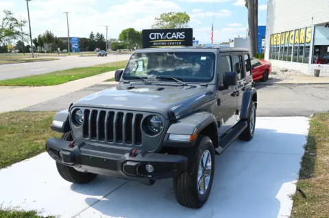 Gray 2022 Jeep Wrangler Unlimited Sahara for sale in Troy, MI