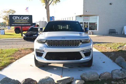 Photos of 2022 Jeep Grand Cherokee Summit 4x4 for sale in Troy, MI at City of Cars