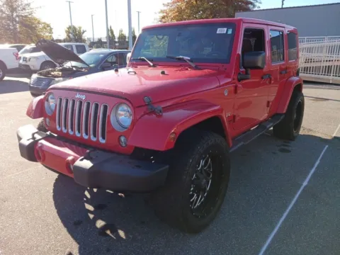 Red 2016 Jeep Wrangler Unlimited Sahara for sale in Maryville, TN