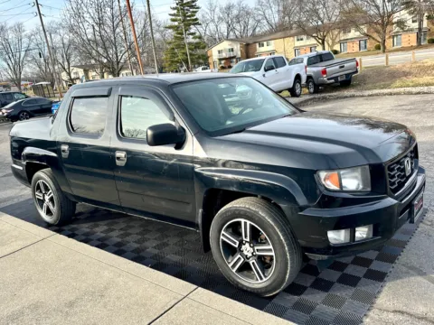 Photos of 2013 Honda Ridgeline 4WD Crew Cab Sport for sale in Indianapolis, IN at Midwest Motors