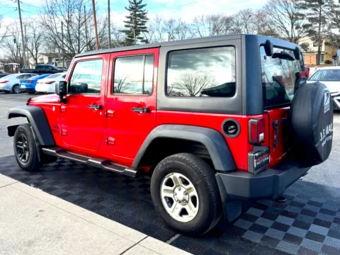 Another view of 2016 Jeep Wrangler Unlimited 4WD 4dr Sport RHD for sale in Indianapolis, IN at Midwest Motors