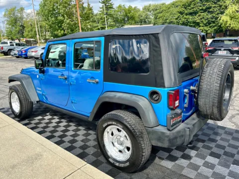 Another view of 2010 Jeep Wrangler Unlimited 4WD 4dr Sport for sale in Indianapolis, IN at Midwest Motors