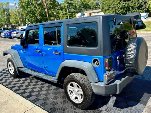 Another view of 2016 Jeep Wrangler Unlimited 4WD 4dr Sport RHD for sale in Indianapolis, IN at Midwest Motors