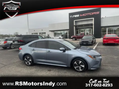 Blue 2021 Toyota Corolla LE for sale in Indianapolis, IN