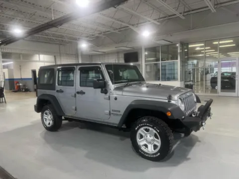 Silver 2015 Jeep Wrangler Unlimited Sport 4WD RHD for sale in Indianapolis, IN