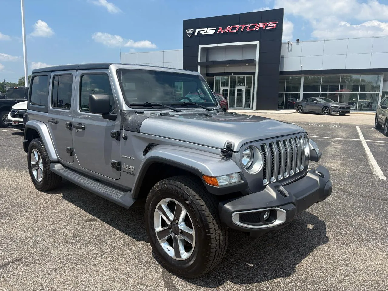 Silver 2020 Jeep Wrangler Unlimited Sahara 4WD for sale in Indianapolis, IN