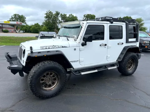 Photos of 2015 Jeep Wrangler Unlimited Sahara Altitude for sale in Indianapolis, IN at RS Motors