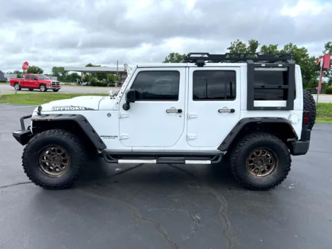Another view of 2015 Jeep Wrangler Unlimited Sahara Altitude for sale in Indianapolis, IN at RS Motors