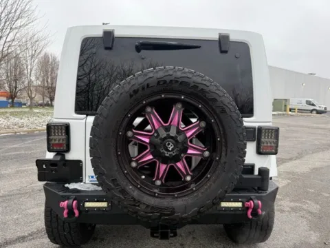 More photos of 2015 Jeep Wrangler Unlimited Sahara at Indy Luxury Motorsports, IN