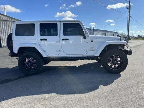 Photos of 2015 Jeep Wrangler Unlimited Sahara for sale in Indianapolis, IN at Indy Luxury Motorsports