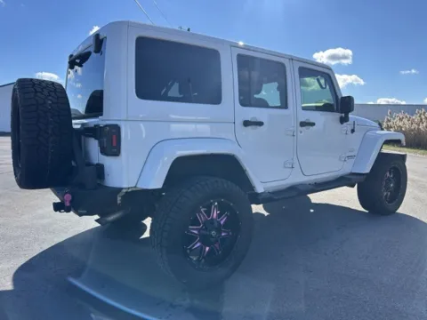 Another view of 2015 Jeep Wrangler Unlimited Sahara for sale in Indianapolis, IN at Indy Luxury Motorsports