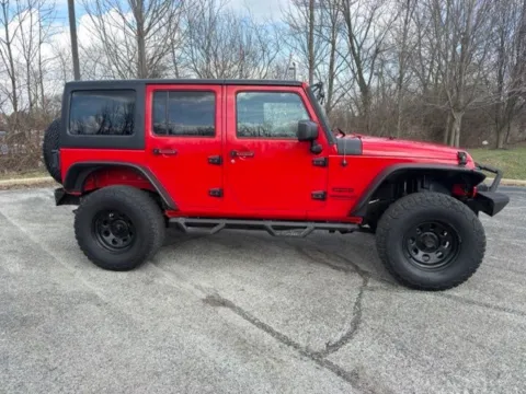Photos of 2015 Jeep Wrangler Unlimited Sport for sale in Indianapolis, IN at Indy Luxury Motorsports
